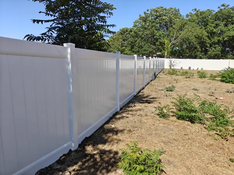 White vinyl backyard privacy fence installation in Chino, CA