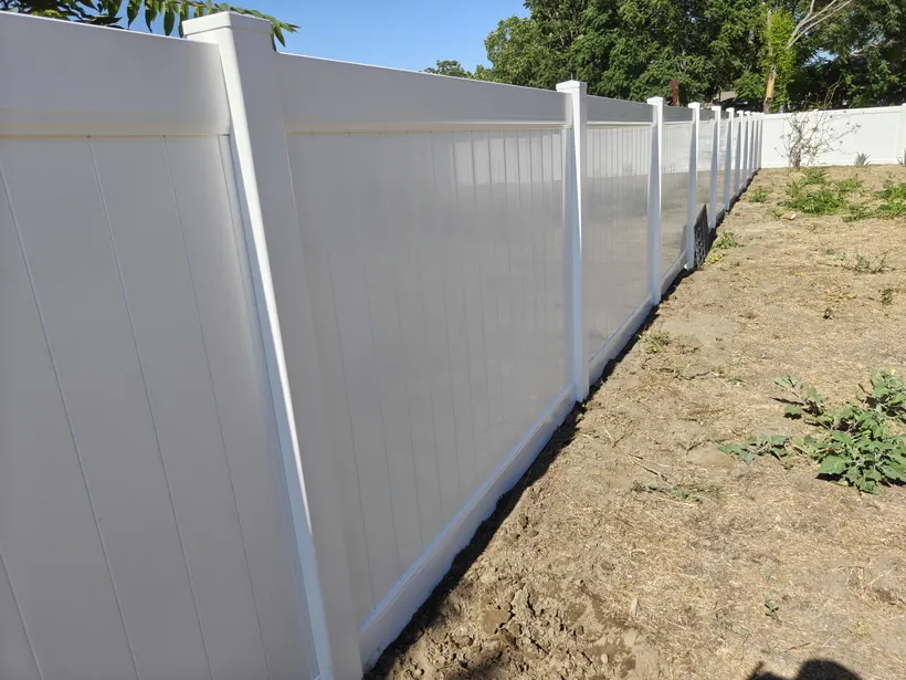 152-foot white vinyl privacy fence across two backyard sides in Chino, CA