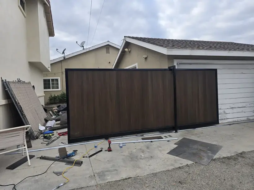 Custom composite sliding driveway gate by Apexguard Fence, San Gabriel Valley