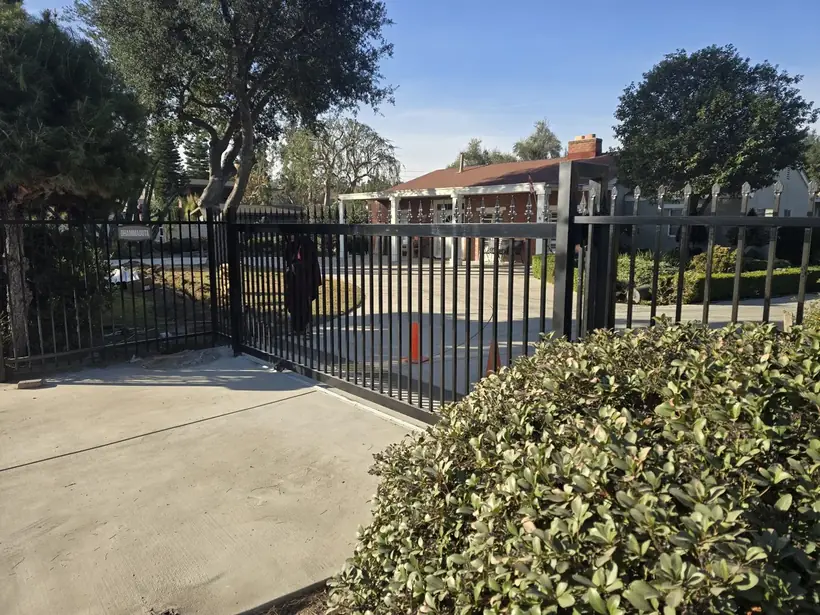 Iron driveway gate installed in Chino, CA by Apexguard Fence