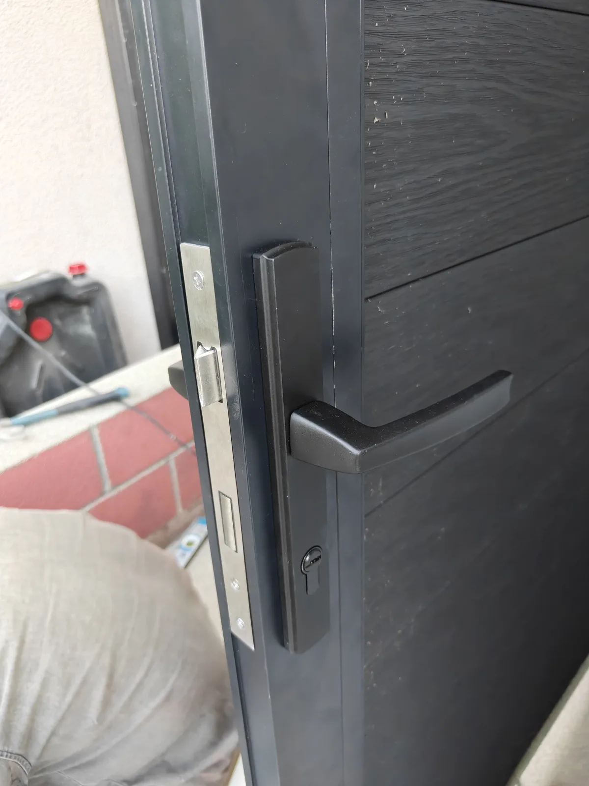 Stainless steel handle on a composite WPC gate by Apexguard Fence