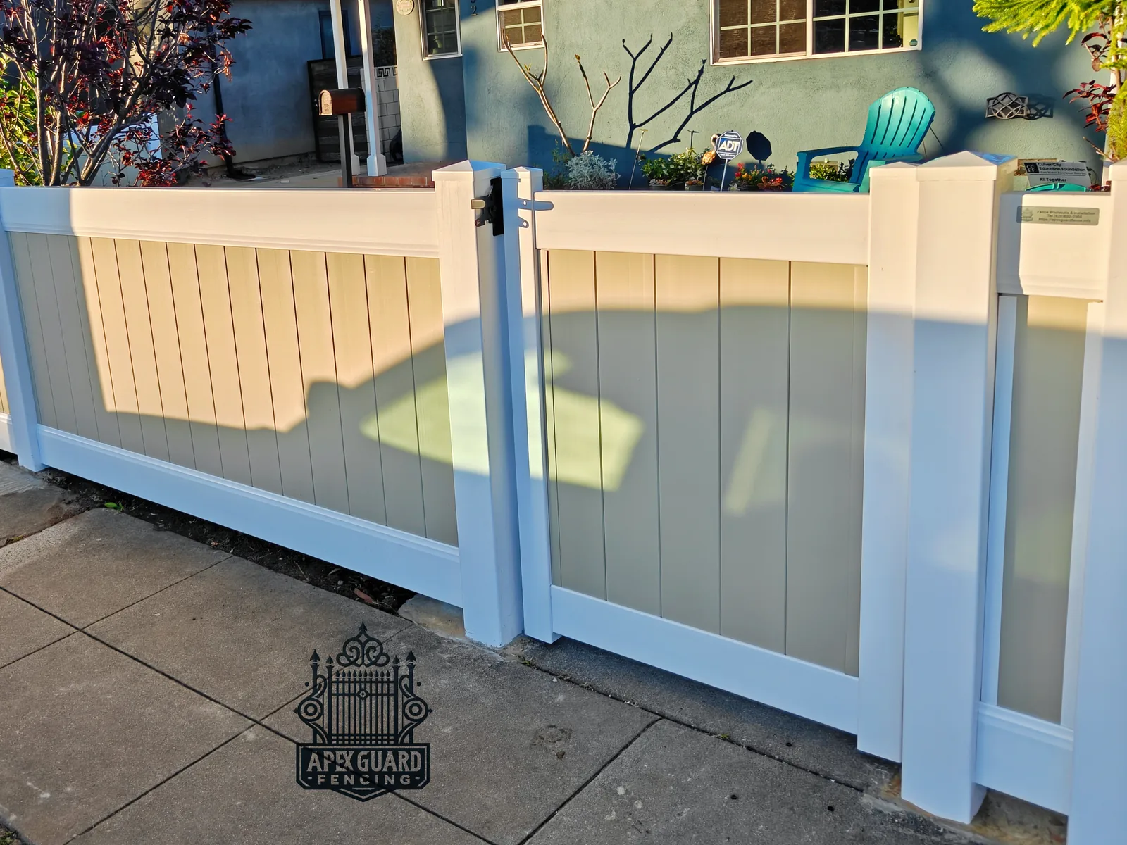 Two-tone vinyl fence with lattice top installed by Apexguard Fence in Walnut, CA