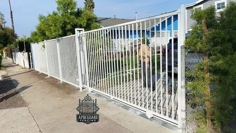 White vinyl yard fence by Apexguard Fence, Southern California