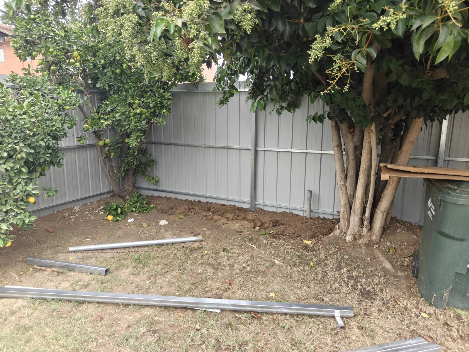 Backyard side of the corrugated steel privacy fence in Whittier, CA by Apexguard Fence