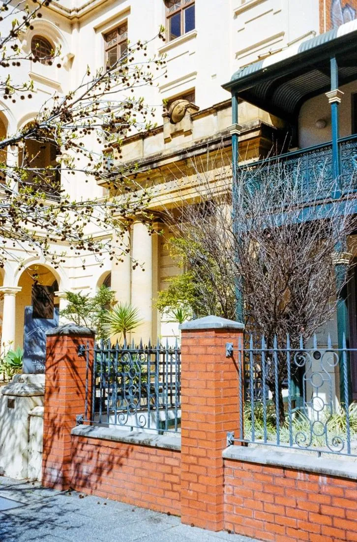 Home with custom wrought iron fence and gate by Apexguard Fence